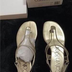 Calvin Klein clear/Gold Sandal thong sandal